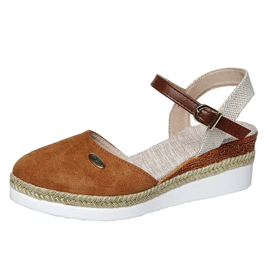 Brown closed-toe espadrille wedges for women, side studio view