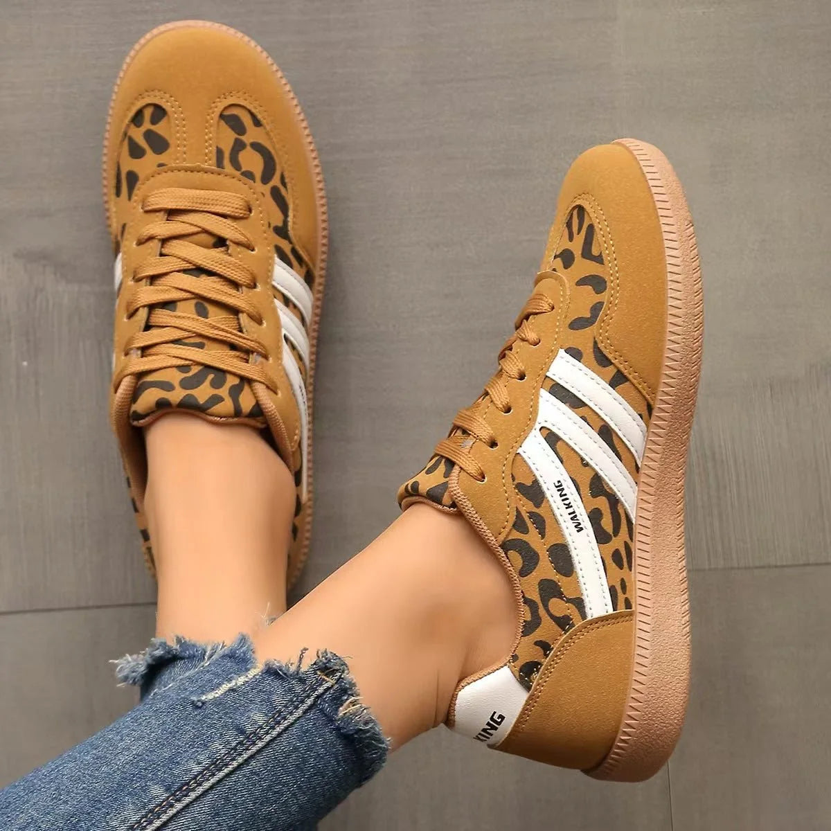 Women's tan leopard-print retro trainers viewed from above