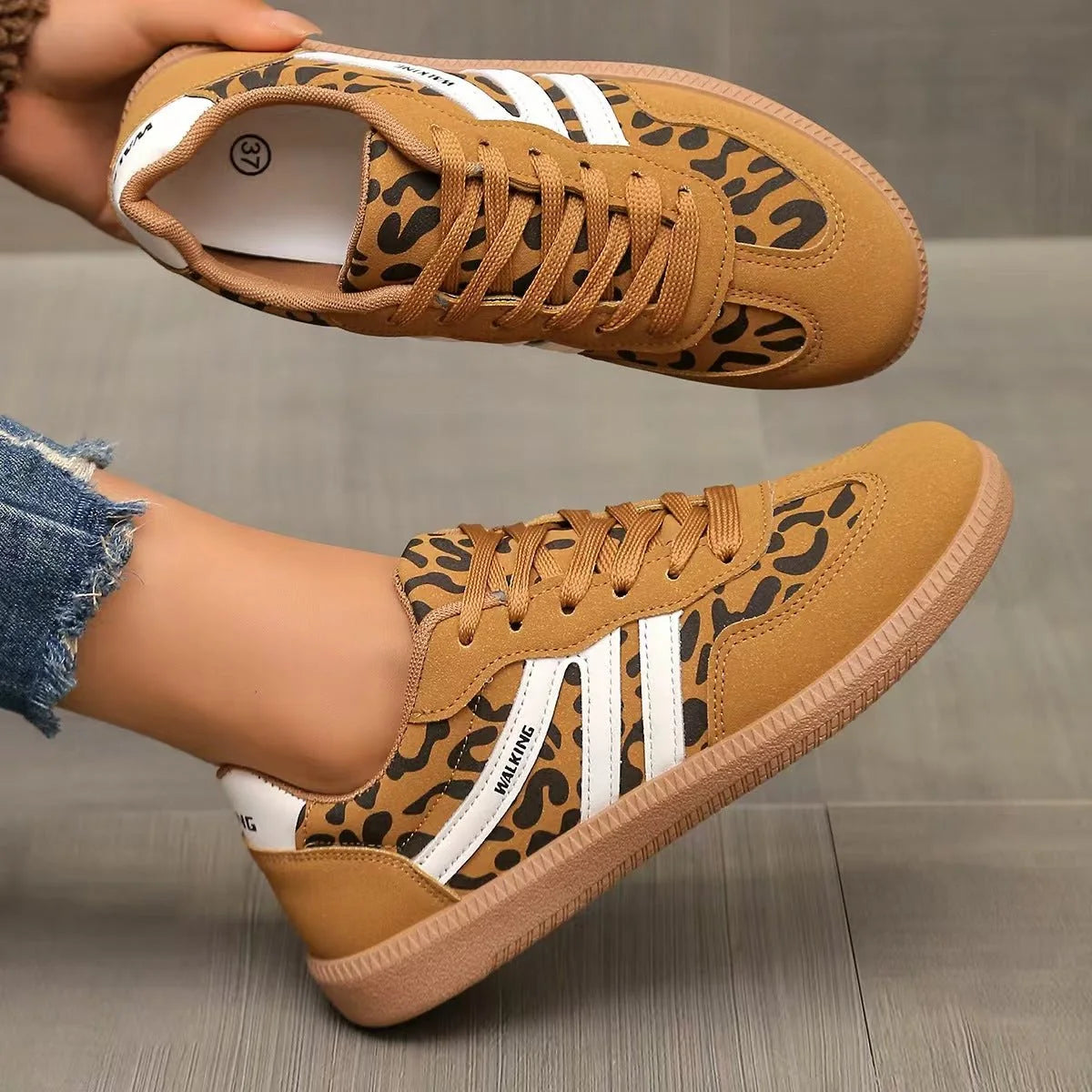Women's tan leopard-print retro trainers shown in side profile