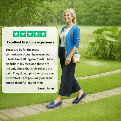 Woman wearing navy wide fit slip-on loafers on a park path